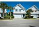 Charming two-story home with a two-car garage and eye-catching, light-blue, front-door at 4808 Cantor Ct., North Myrtle Beach, SC 29582