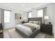 Cozy bedroom with neutral tones, a large bed, and two bedside tables at 1099 Milford Way, Myrtle Beach, SC 29588