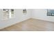 Bright, airy bedroom with three large windows providing natural light and views of the outdoors at 1099 Milford Way, Myrtle Beach, SC 29588