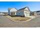 View of the home's exterior with a two car detached garage and blue siding at 1099 Milford Way, Myrtle Beach, SC 29588