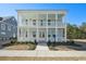 Charming two-story home features a double porch and white trim for a classic Southern look at 1099 Milford Way, Myrtle Beach, SC 29588