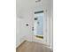 Bright mudroom featuring a door, built-in shelving, and a bench at 1099 Milford Way, Myrtle Beach, SC 29588