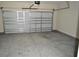 Spacious two-car garage with automatic opener and concrete floor at 110 Hallandale Lane, Murrells Inlet, SC 29576