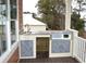 Outdoor kitchen features granite countertops and stainless steel appliances at 110 Hallandale Lane, Murrells Inlet, SC 29576