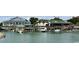 View of waterfront restaurants and a boat at 110 Hallandale Lane, Murrells Inlet, SC 29576