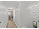 Clean hallway with light walls and wood flooring at 118 Sly Fox Trail, Myrtle Beach, SC 29588