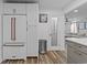 White kitchen with stainless steel appliances and pantry at 118 Sly Fox Trail, Myrtle Beach, SC 29588