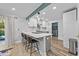 Modern kitchen with white cabinets, quartz countertops and an island at 118 Sly Fox Trail, Myrtle Beach, SC 29588