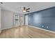 Bright living room with hardwood floors and ceiling fan at 118 Sly Fox Trail, Myrtle Beach, SC 29588