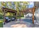 Spacious patio with pergola, seating, and an outdoor entertainment area at 118 Sly Fox Trail, Myrtle Beach, SC 29588