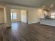 Bright living space with hardwood floors, abundant natural light and open concept design for flexible entertaining or relaxed living at 216 Palmetto Sand Loop, Conway, SC 29527