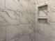 Tiled shower features recessed shelving for soaps and shampoos at 216 Palmetto Sand Loop, Conway, SC 29527