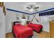 Nautical themed bedroom with two twin beds, oars, and sailboat decor at 212 2Nd Ave. N # 364, North Myrtle Beach, SC 29582