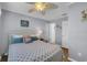 Cozy bedroom featuring a comfortable bed, coastal décor, and a ceiling fan, creating a relaxing atmosphere at 212 2Nd Ave. N # 364, North Myrtle Beach, SC 29582