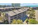 Scenic exterior view of a beachfront condo complex with stunning ocean views and lush landscaping at 212 2Nd Ave. N # 364, North Myrtle Beach, SC 29582