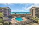Community swimming pool with sundeck, pergolas and ocean view at 212 2Nd Ave. N # 364, North Myrtle Beach, SC 29582