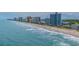 Beautiful aerial view of the coastline, showcasing beachfront resorts and sandy shores at 3000 N Ocean Blvd. # 1601, Myrtle Beach, SC 29577