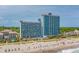 Stunning aerial view of a beachfront resort with multiple pools and beautiful oceanfront access at 3000 N Ocean Blvd. # 1601, Myrtle Beach, SC 29577