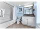Clean bathroom with a shower-tub combo, tiled flooring, and a white vanity at 3000 N Ocean Blvd. # 1601, Myrtle Beach, SC 29577