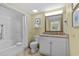 Well-maintained bathroom featuring tiled floors, granite vanity, and tub-shower combo with curtain at 3000 N Ocean Blvd. # 1601, Myrtle Beach, SC 29577