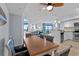 Open-concept dining area with views of the living space, kitchen, and ocean views at 3000 N Ocean Blvd. # 1601, Myrtle Beach, SC 29577