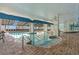 Inviting indoor pool area with shallow water features and a spa tub at 3000 N Ocean Blvd. # 1601, Myrtle Beach, SC 29577
