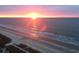 Stunning ocean sunset reflecting off the beach and waves, creating a serene scene at 3000 N Ocean Blvd. # 1601, Myrtle Beach, SC 29577