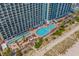 Aerial shot features pool with water features, lounge chairs and umbrellas along the beach at 3000 N Ocean Blvd. # 1601, Myrtle Beach, SC 29577
