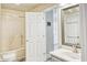 Clean bathroom with shower/tub combo, vanity, and neutral color scheme at 328 S Waccamaw Dr., Garden City Beach, SC 29576