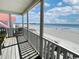 Screened porch with unobstructed view of beach and ocean at 328 S Waccamaw Dr., Garden City Beach, SC 29576