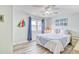 Charming bedroom with a full bed, nautical decor, and a bright airy feel at 328 S Waccamaw Dr., Garden City Beach, SC 29576