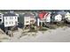 Beachfront homes on stilts, with decks and vibrant architecture along the scenic shoreline at 328 S Waccamaw Dr., Garden City Beach, SC 29576