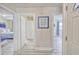 Bright hallway with views into bedrooms, showcasing the home's layout at 328 S Waccamaw Dr., Garden City Beach, SC 29576