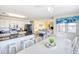 Open-concept kitchen and dining area with updated appliances and plenty of seating at 328 S Waccamaw Dr., Garden City Beach, SC 29576