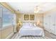 Inviting main bedroom with a queen-sized bed and a window overlooking the ocean at 328 S Waccamaw Dr., Garden City Beach, SC 29576