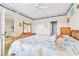 Comfortable bedroom boasts natural light, nautical decor, and a serene atmosphere at 4430 Turtle Ln. # 2-C, Little River, SC 29566
