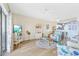 Airy living room with ocean-themed decor, cozy seating, and a ceiling fan for added comfort at 4430 Turtle Ln. # 2-C, Little River, SC 29566