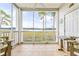 Relaxing screened porch with views of the lush marsh and waterfront at 4430 Turtle Ln. # 2-C, Little River, SC 29566