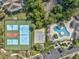 A high-angle view showcases the community pool, playground, and tennis courts at this beautiful property at 9772 Leyland Dr. # 9772-9, Myrtle Beach, SC 29572