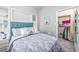 Comfortable bedroom with a plush bed and a view into a tidy closet at 9772 Leyland Dr. # 9772-9, Myrtle Beach, SC 29572