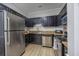 Contemporary kitchen featuring granite countertops and sleek stainless steel appliances at 9772 Leyland Dr. # 9772-9, Myrtle Beach, SC 29572