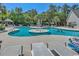 Community pool with a fountain and seating areas surrounded by lush trees at 9772 Leyland Dr. # 9772-9, Myrtle Beach, SC 29572