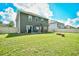 Large backyard with patio, fire pit and home exterior view at 3149 Bramble Glen Dr., Myrtle Beach, SC 29579