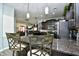 Kitchen with granite island and view into adjacent living area at 3149 Bramble Glen Dr., Myrtle Beach, SC 29579
