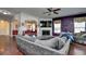 Open living room with sectional sofa, fireplace and hardwood floors at 3149 Bramble Glen Dr., Myrtle Beach, SC 29579