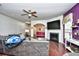 Living area with sectional sofa, fireplace, and hardwood floors at 3149 Bramble Glen Dr., Myrtle Beach, SC 29579