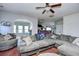 Spacious living room with sectional sofa and views of kitchen and dining areas at 3149 Bramble Glen Dr., Myrtle Beach, SC 29579