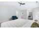 Spacious bedroom with vaulted ceiling, a chair, and neutral color palette at 5800 Creekside Dr., Myrtle Beach, SC 29588