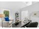 Home office featuring modern desk, neutral walls, and large window at 5800 Creekside Dr., Myrtle Beach, SC 29588