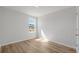 Bedroom with luxury vinyl flooring, natural light and white walls at 68 Cape Point Dr., Conway, SC 29527